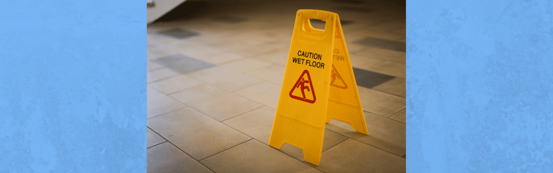 wet floor sign on tile floor